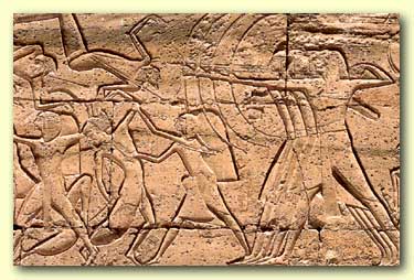 Bowmen of Ramesses III's infantry fire arrows at the Libyan enemies